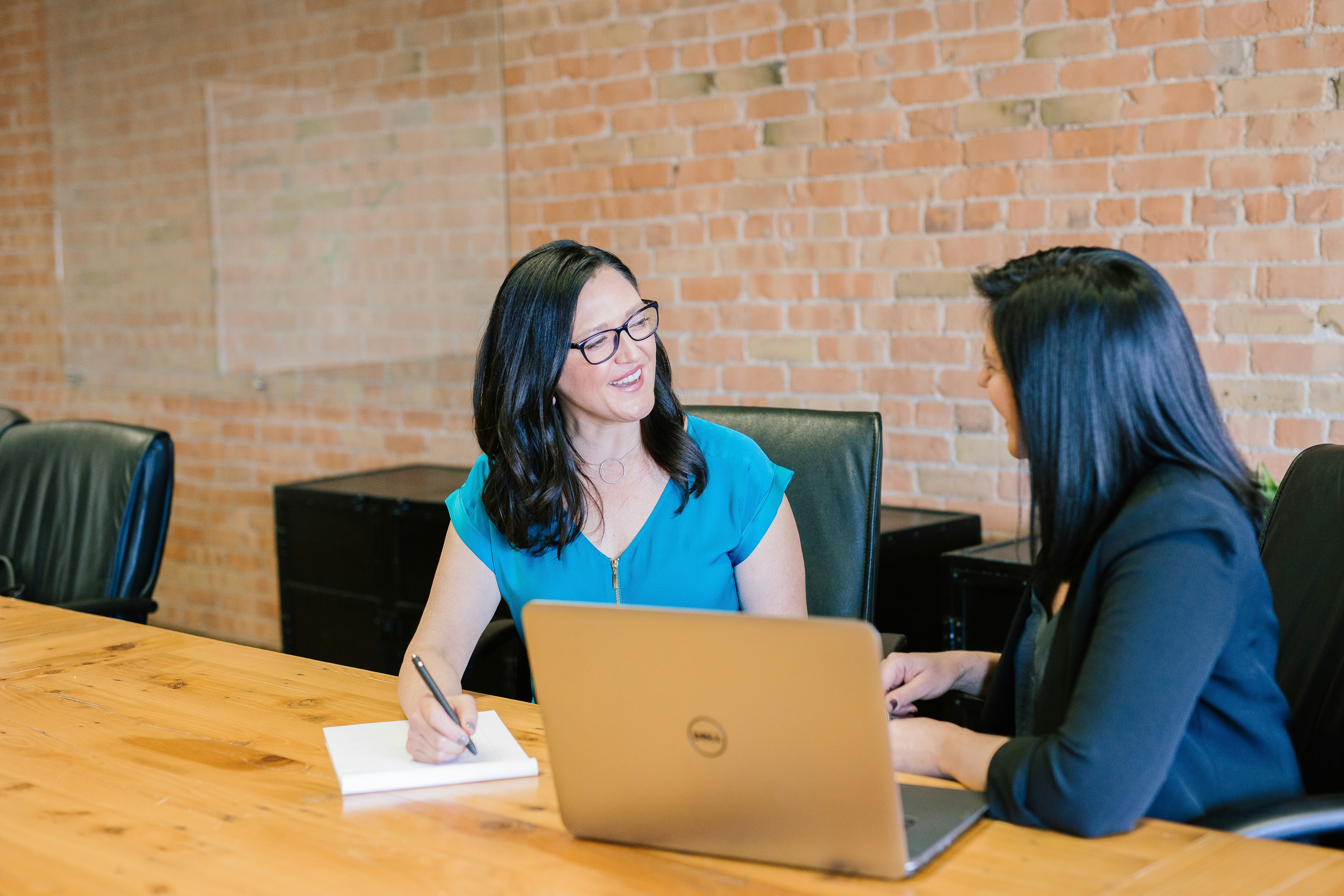 Women having a business conversation in an office