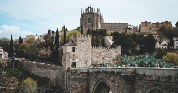 castle on a river in Spain