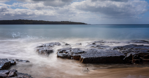 rocks submerged in ocean