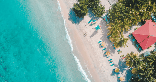 Beautiful ocean blue crashing upon shore