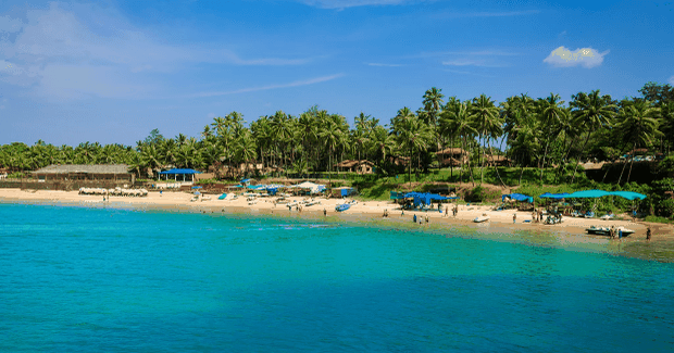 beautiful blue beach with umbrellas