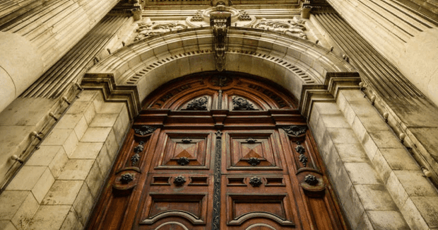 nice looking wooden door on old church